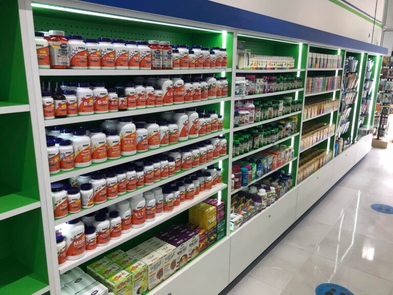 Healthy Pharmacy store aisle stocked with vitamins and supplements